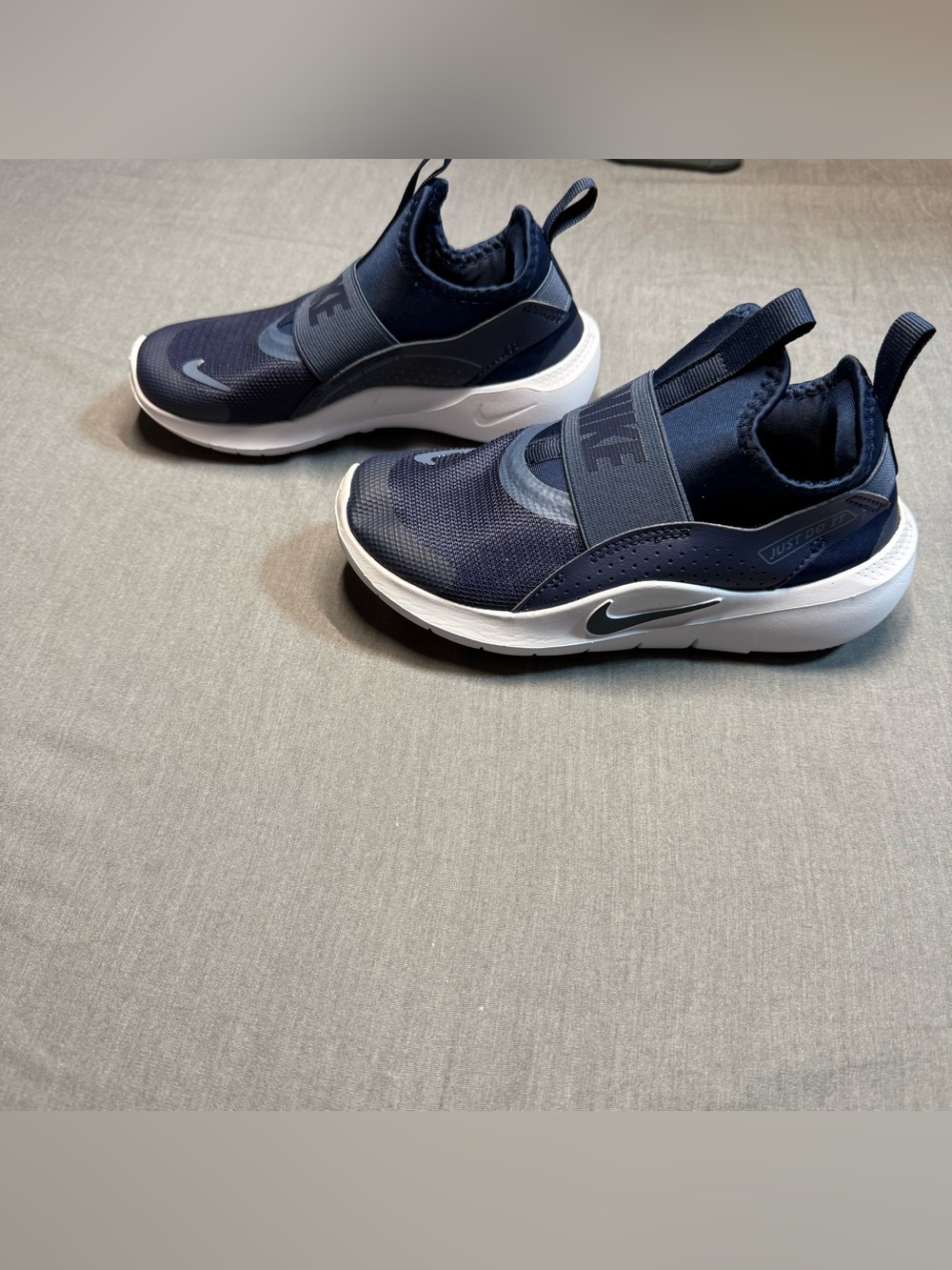 Nike Kids Navy and White Slip-On Sneakers